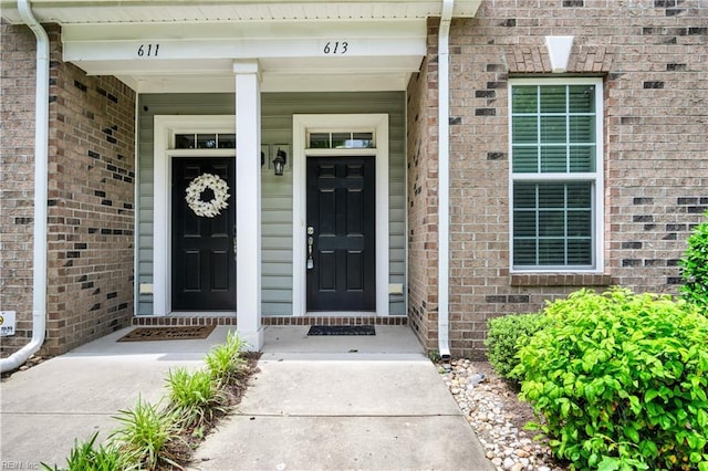 613 Freeman Dr, Hampton, VA 23666 - doorway to property featuring brick siding