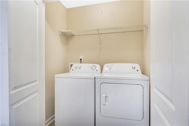 613 Freeman Dr, Hampton, VA 23666 - clothes washing area with washer and dryer