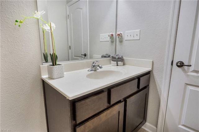 613 Freeman Dr, Hampton, VA 23666 - bathroom with a textured wall and vanity