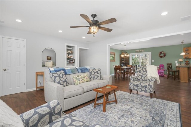 28111 Harbor Rd, Melfa, VA 23410 - living area with wood finished floors, a ceiling fan, recessed lighting, a chandelier, and baseboards