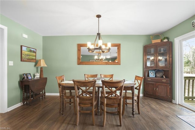 28111 Harbor Rd, Melfa, VA 23410 - dining space featuring dark wood-type flooring, a chandelier, and plenty of natural light