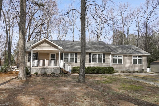 28111 Harbor Rd, Melfa, VA 23410 - ranch-style home featuring a porch and a shingled roof