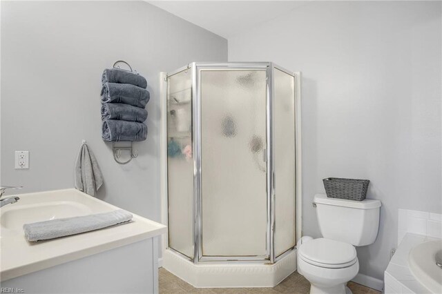 28111 Harbor Rd, Melfa, VA 23410 - full bath featuring a stall shower, toilet, a sink, and a bath