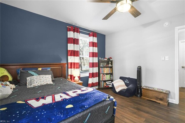 28111 Harbor Rd, Melfa, VA 23410 - bedroom with wood finished floors and ceiling fan