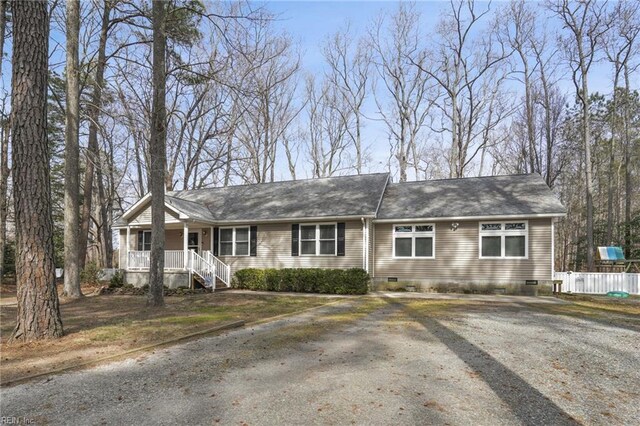 28111 Harbor Rd, Melfa, VA 23410 - ranch-style house with crawl space, covered porch, driveway, and fence