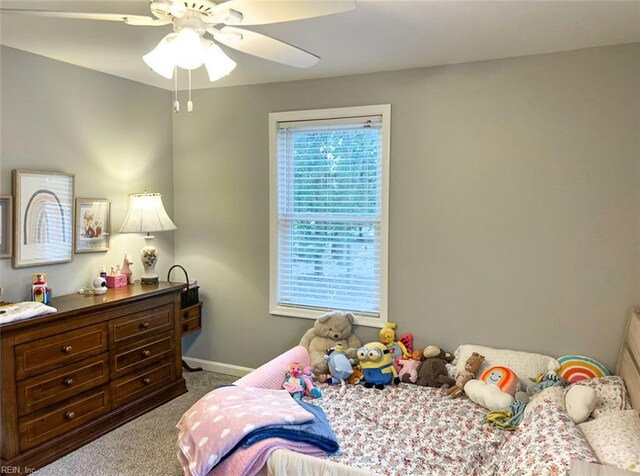 28111 Harbor Rd, Melfa, VA 23410 - carpeted bedroom with baseboards and a ceiling fan