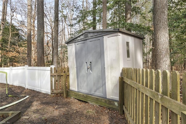 28111 Harbor Rd, Melfa, VA 23410 - view of shed featuring fence and view of scattered trees