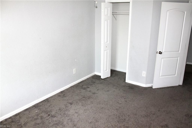 1307 Hibie St, Norfolk, VA 23523 - unfurnished bedroom featuring dark carpet, a closet, and baseboards