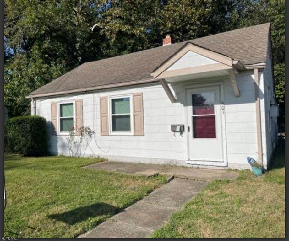 501 Astor Cir, Norfolk, VA 23505 - ranch-style home with roof with shingles, a front yard, and a chimney