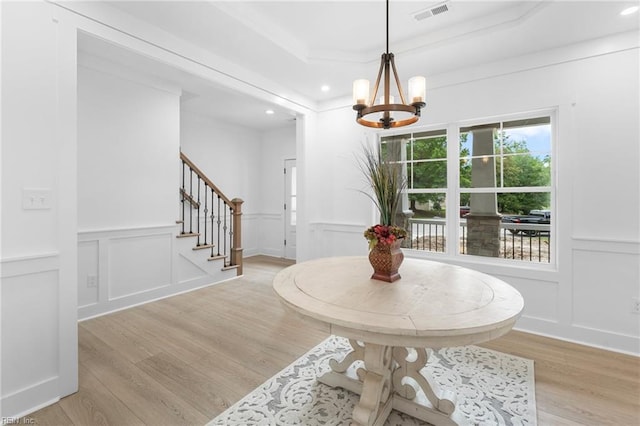 107 Wheeley Cir, Yorktown, VA 23693 - dining space with a decorative wall, a chandelier, light wood finished floors, recessed lighting, and stairway