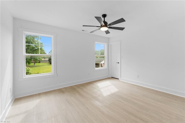 107 Wheeley Cir, Yorktown, VA 23693 - empty room featuring healthy amount of natural light, baseboards, and light wood-style flooring