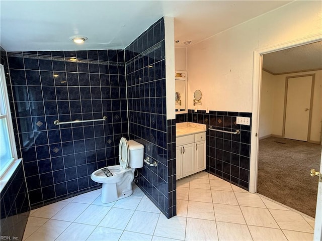 1224 Old Clubhouse Rd, Virginia Beach, VA 23453 - bathroom featuring tile walls, tile patterned flooring, vanity, and toilet