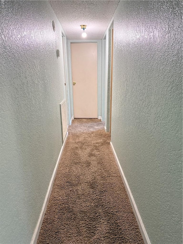 1224 Old Clubhouse Rd, Virginia Beach, VA 23453 - corridor with a textured wall, carpet flooring, a textured ceiling, and baseboards