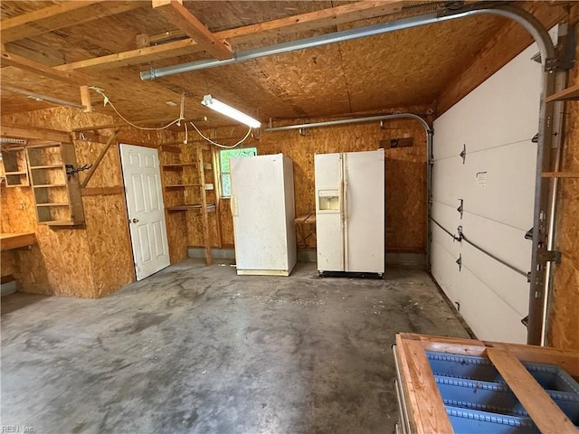 1224 Old Clubhouse Rd, Virginia Beach, VA 23453 - garage with white refrigerator with ice dispenser and freestanding refrigerator