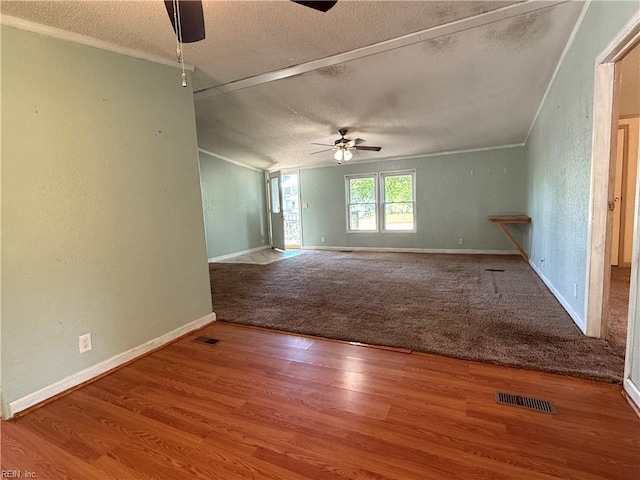 1224 Old Clubhouse Rd, Virginia Beach, VA 23453 - spare room with a ceiling fan, a textured ceiling, carpet floors, vaulted ceiling, and wood finished floors