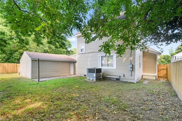 1250 27th St, Newport News, VA 23607 - rear view of house featuring central AC unit and an outdoor structure