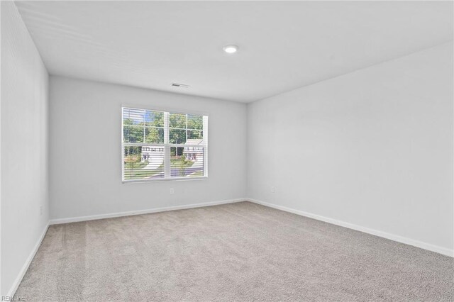 7130 Lovegrass Ct, New Kent, VA 23124 - spare room with carpet flooring and baseboards