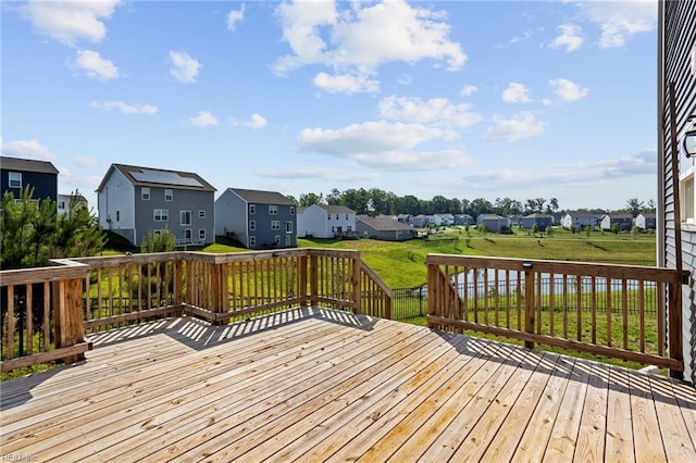 7130 Lovegrass Ct, New Kent, VA 23124 - wooden deck with a residential view and a lawn
