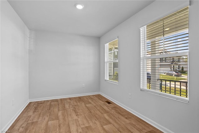 7130 Lovegrass Ct, New Kent, VA 23124 - spare room with wood finished floors and baseboards