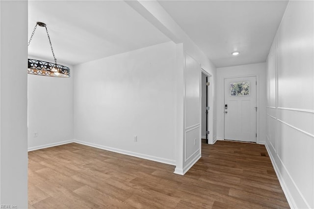 7130 Lovegrass Ct, New Kent, VA 23124 - foyer featuring wood finished floors and baseboards