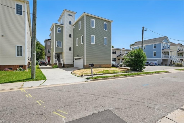 9628 7th Bay St Unit A, Norfolk, VA 23518 - view of property featuring driveway and a garage