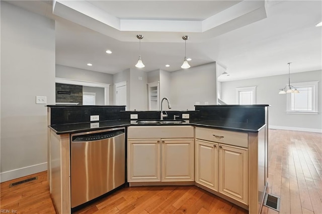 9628 7th Bay St Unit A, Norfolk, VA 23518 - kitchen with stainless steel dishwasher, a sink, cream cabinetry, baseboards, and recessed lighting