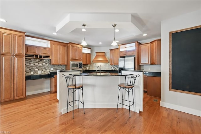 9628 7th Bay St Unit A, Norfolk, VA 23518 - kitchen with stainless steel appliances, dark countertops, a kitchen breakfast bar, decorative backsplash, and recessed lighting