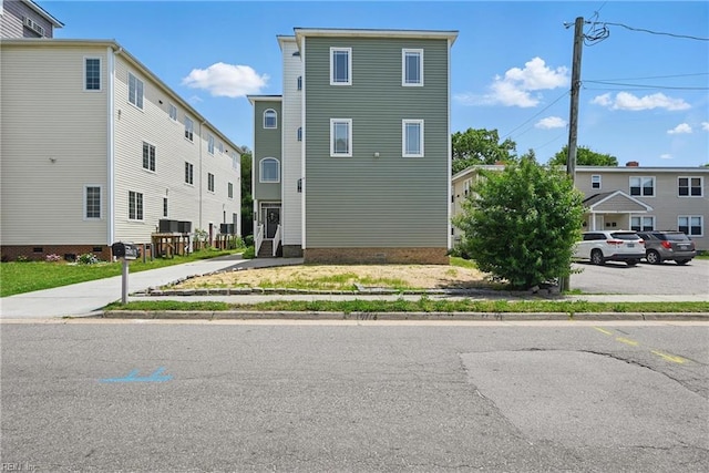 9628 7th Bay St Unit A, Norfolk, VA 23518 - view of building exterior with uncovered parking