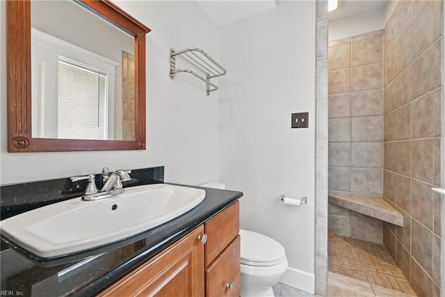 9628 7th Bay St Unit A, Norfolk, VA 23518 - bathroom featuring toilet, tiled shower, and vanity