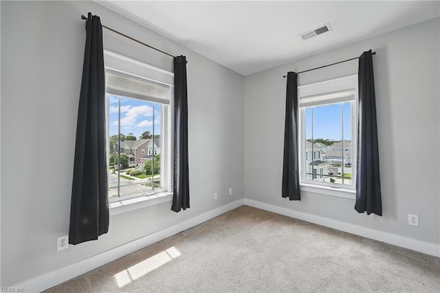9628 7th Bay St Unit A, Norfolk, VA 23518 - unfurnished room featuring carpet floors, plenty of natural light, and baseboards