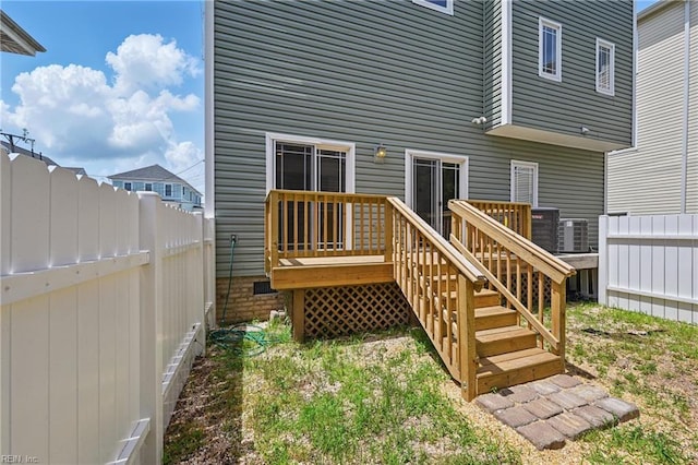 9628 7th Bay St Unit A, Norfolk, VA 23518 - wooden deck with a fenced backyard, stairway, and central AC