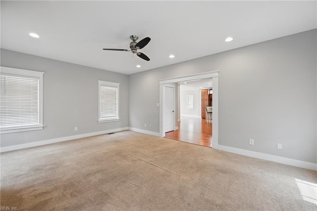 9628 7th Bay St Unit A, Norfolk, VA 23518 - empty room featuring light colored carpet, ceiling fan, baseboards, recessed lighting, and plenty of natural light