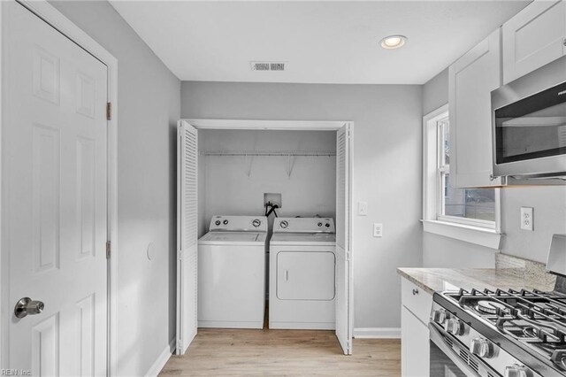 2728 Sewells Point Rd, Norfolk, VA 23513 - washroom with independent washer and dryer, light wood finished floors, baseboards, and recessed lighting