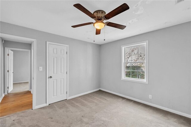 2728 Sewells Point Rd, Norfolk, VA 23513 - unfurnished bedroom with carpet flooring, baseboards, and a ceiling fan