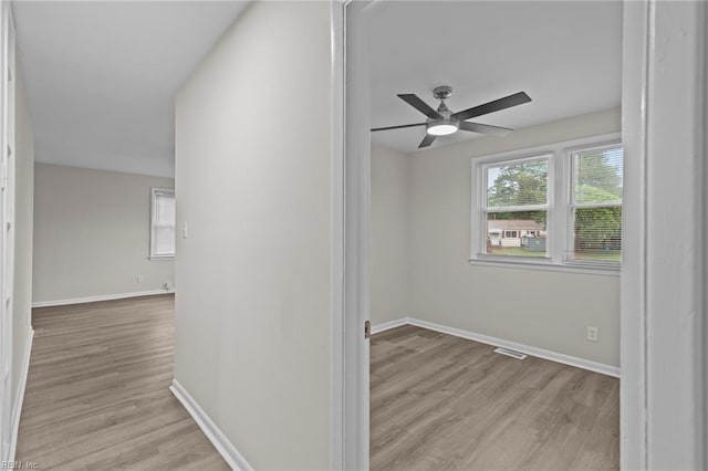 1 Kilbride Ct, Chesapeake, VA 23325 - spare room featuring wood finished floors, a ceiling fan, and baseboards