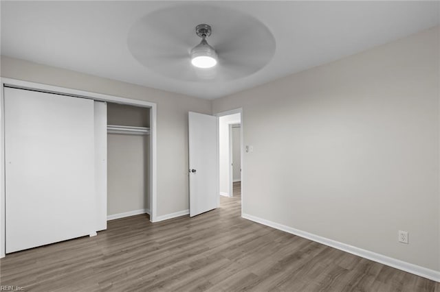 1 Kilbride Ct, Chesapeake, VA 23325 - unfurnished bedroom with wood finished floors, a closet, baseboards, and ceiling fan