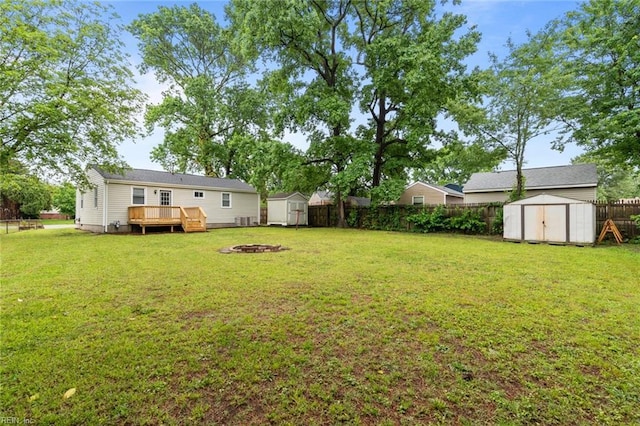 1 Kilbride Ct, Chesapeake, VA 23325 - view of yard featuring a deck and an outdoor fire pit