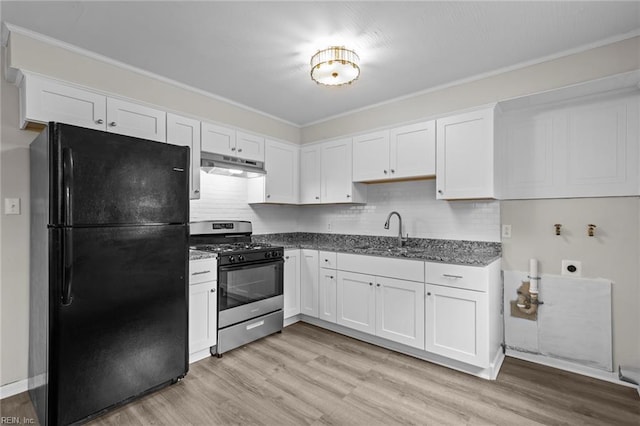 1 Kilbride Ct, Chesapeake, VA 23325 - kitchen featuring freestanding refrigerator, stainless steel gas range, a sink, under cabinet range hood, and white cabinetry