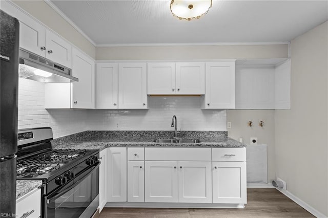 1 Kilbride Ct, Chesapeake, VA 23325 - kitchen featuring range with gas stovetop, a sink, under cabinet range hood, white cabinets, and light wood-style flooring