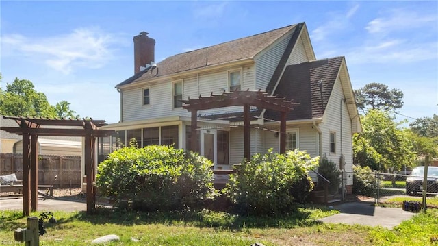 7371 Kirby Cres, Norfolk, VA 23505 - back of house featuring a pergola, a chimney, and a patio area