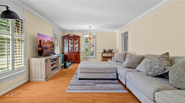 7371 Kirby Cres, Norfolk, VA 23505 - living area with a chandelier, ornamental molding, light wood-style flooring, and baseboards