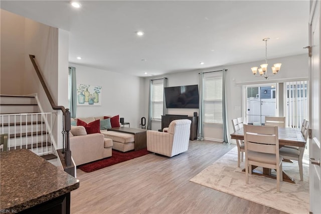 705 Mapleleaf Ln, Virginia Beach, VA 23462 - living room featuring light wood-style floors, a chandelier, recessed lighting, plenty of natural light, and stairs