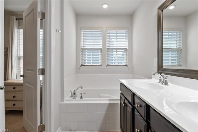 705 Mapleleaf Ln, Virginia Beach, VA 23462 - bathroom with double vanity, plenty of natural light, and a garden tub