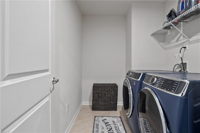 705 Mapleleaf Ln, Virginia Beach, VA 23462 - laundry area with washing machine and clothes dryer, light tile patterned floors, and baseboards