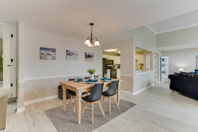 3914 Van Ness Dr, Virginia Beach, VA 23462 - dining space featuring light wood-type flooring, baseboards, and a chandelier
