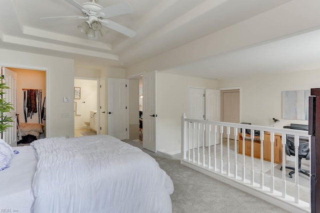 3914 Van Ness Dr, Virginia Beach, VA 23462 - carpeted bedroom with a raised ceiling, a walk in closet, an office area, connected bathroom, and a closet
