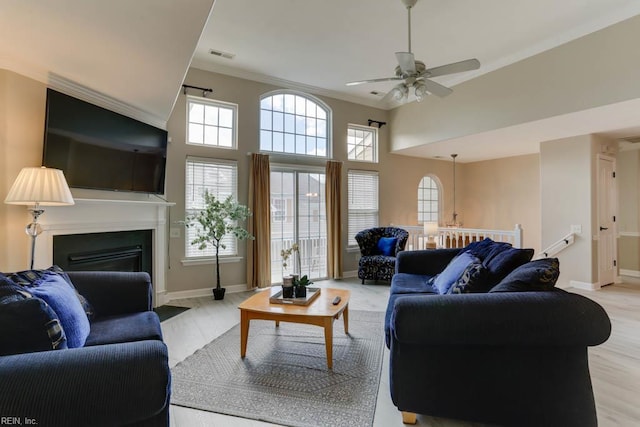 3914 Van Ness Dr, Virginia Beach, VA 23462 - living area featuring ceiling fan, light wood-style flooring, ornamental molding, baseboards, and a fireplace