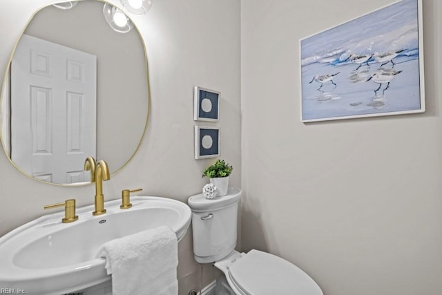 2512 E Ocean View Ave Unit A, Norfolk, VA 23518 - half bathroom featuring a sink and toilet
