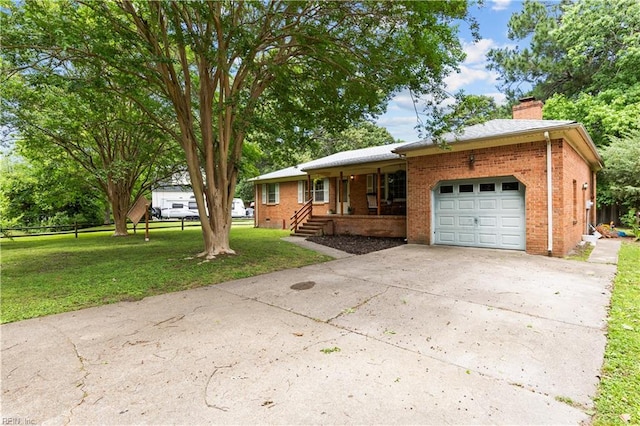 6110 Lyndhurst Ave, Norfolk, VA 23502 - view of front of property featuring a garage, a porch, a chimney, brick siding, and a front lawn