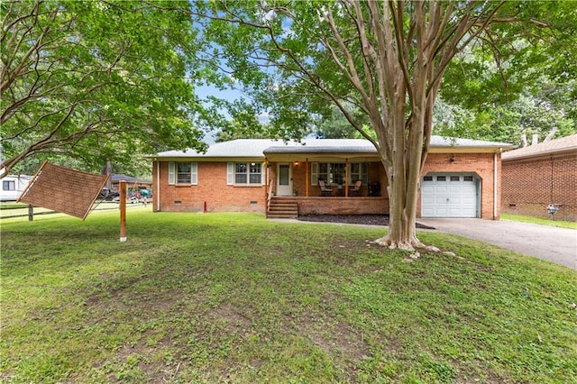 6110 Lyndhurst Ave, Norfolk, VA 23502 - ranch-style house with crawl space, a garage, a front lawn, driveway, and brick siding